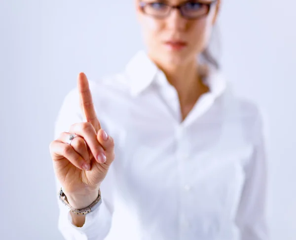 Frau berührt imaginären Bildschirm mit dem Finger — Stockfoto