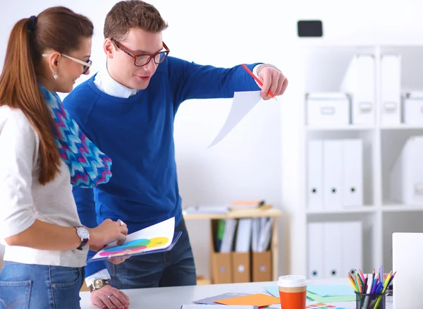 Young business people working at office on new project — Stock Photo, Image