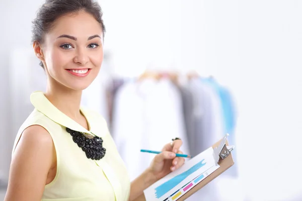 Modern young fashion designer working at studio. — Stock Photo, Image