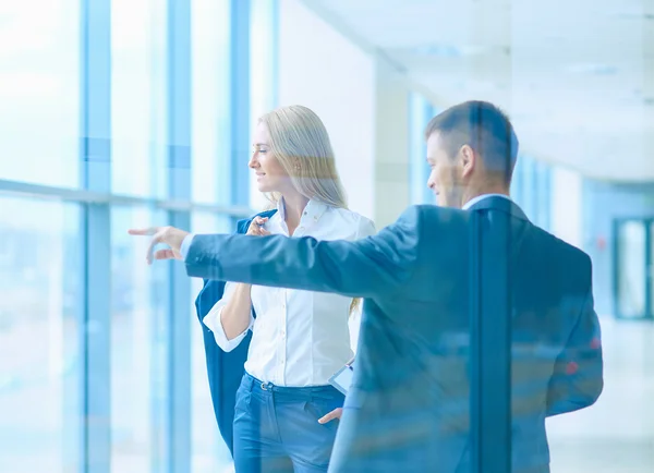 Smiling successful business team standing in office — Stock Photo, Image