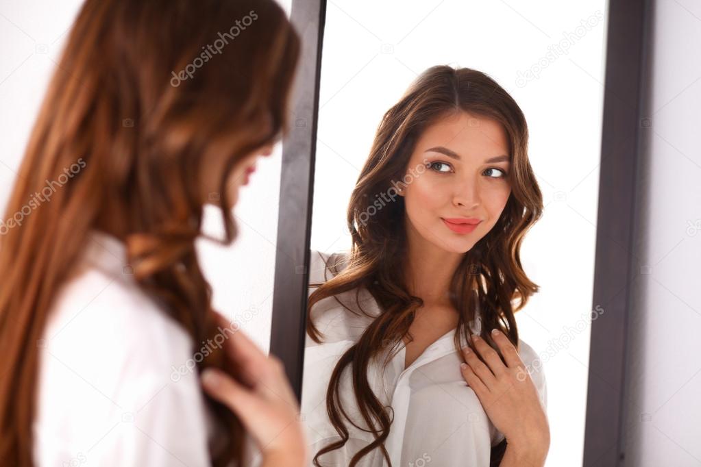 Girl Looking At Mirror Telegraph