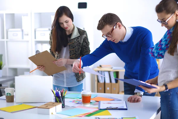 Young business people working at office on new project — Stock Photo, Image