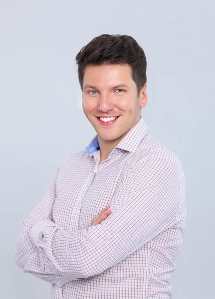 Business man or manager standing against his desk at the office — Stock Photo, Image