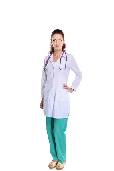 Portrait of young woman doctor with white coat standing in hospital — Stock Photo, Image