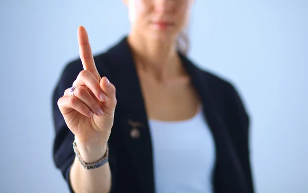 Frau berührt imaginären Bildschirm mit dem Finger — Stockfoto