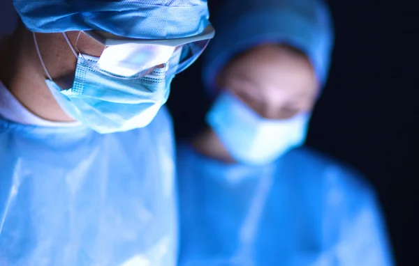 Team surgeon at work in operating room. — Stock Photo, Image