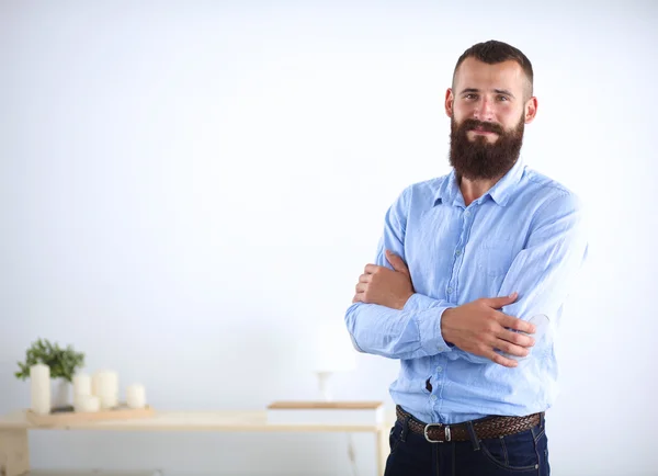 Portrait of handsome man standing, isolated on grey background — Stock Photo, Image