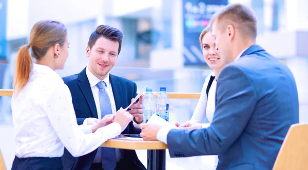 Group of happy young business people in a meeting at office — Stock Photo, Image