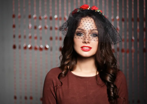 Portrait of beautiful young woman face. Isolated on dark background — Stock Photo, Image