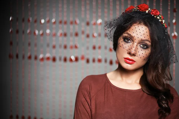 Portrait of beautiful young woman face. Isolated on dark background — Stock Photo, Image