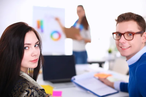 Young business people working at office on new project — Stock Photo, Image