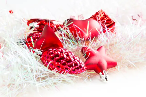 Christmas holiday decorations, red heart, pine cone, bell, gift — Stock Photo, Image