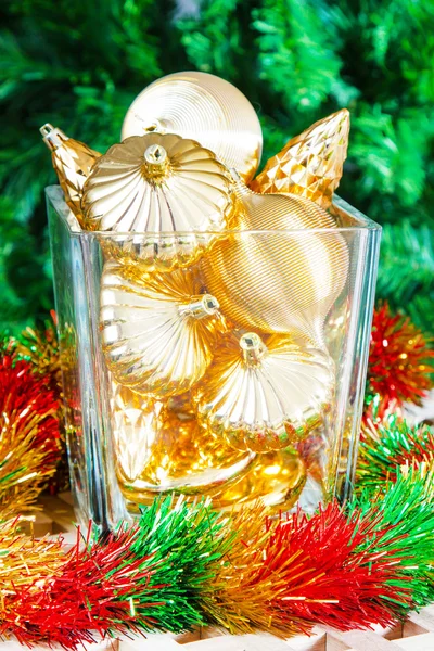 Christmas gold colored decorations in the vase Stock Picture