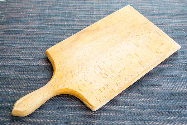 Tabla de cortar de madera en marrón —  Fotos de Stock