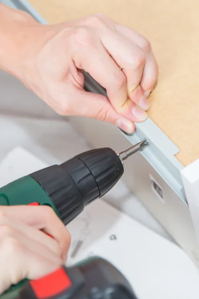 Assembling  Furniture with a screwdriver — Stock Photo, Image