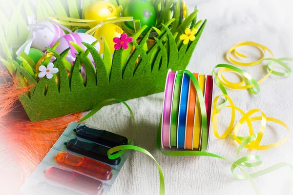 Colorful dyes and ribbons for easter eggs preparation — Stock Photo, Image