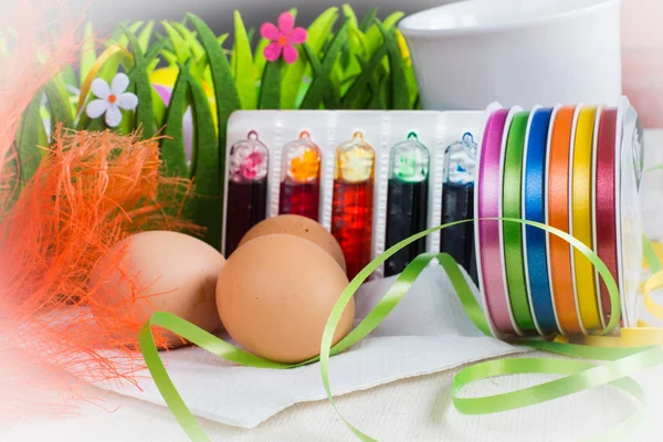 Colorful dyes and ribbons for easter eggs preparation — Stock Photo, Image