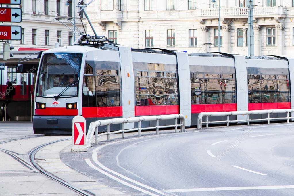 Modern red tram in Vienna Austria.
