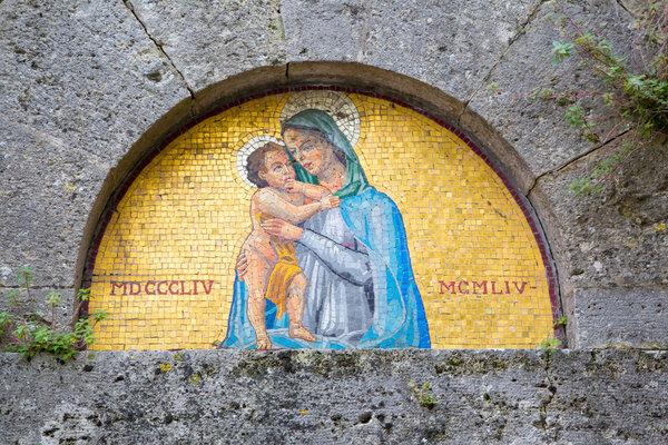 St Mary painting at the wall in Tuscany, Italy