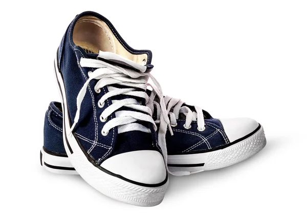 Zapatos deportivos de color azul oscuro uno sobre el otro —  Fotos de Stock