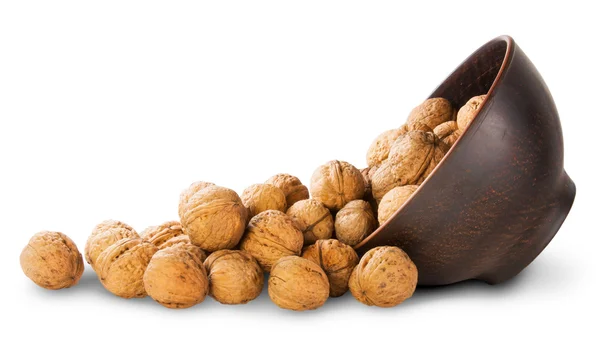 Walnuts Spill Out Of A Clay Bowl — Stock Photo, Image