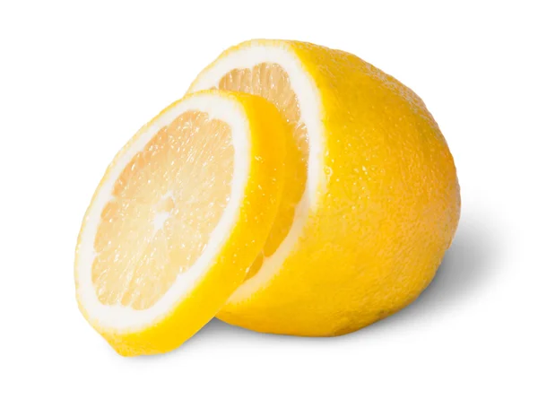 Half Of A Lemon With One Slice — Stock Photo, Image