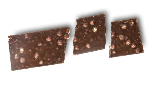Törött cserép, sötét csokoládé egész mogyoró — Stock Fotó