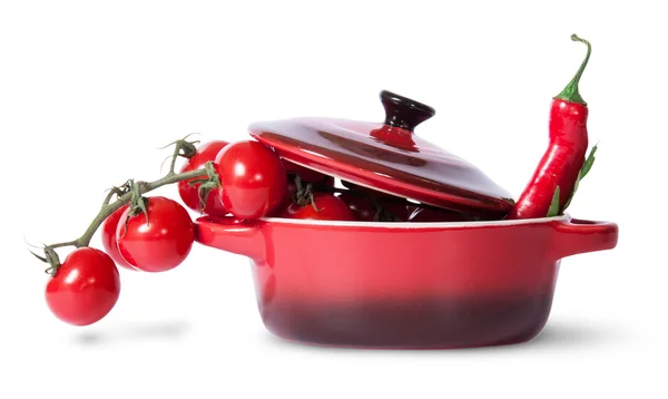 Cherry tomatoes with parsley and chili in saucepan — Stock Photo, Image