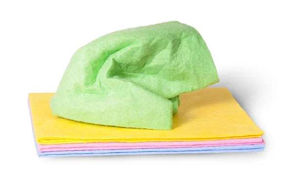 Multicolored cleaning cloths crumpled on top — Stock Photo, Image