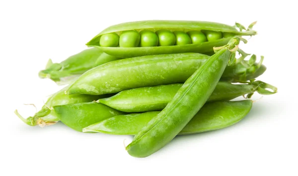 Pile of fresh green peas in the pods 图库图片