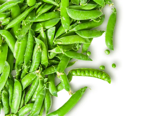 The scattered pods of green peas — Stock Photo, Image