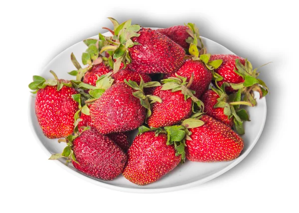 Front and top pile of fresh strawberries on white plate — Stock Photo, Image