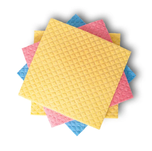 Multicolored sponges for dishwashing in chaotic order top view — Stock Photo, Image