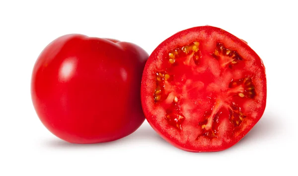 Een en een half rijpe sappige rode tomaten — Stockfoto