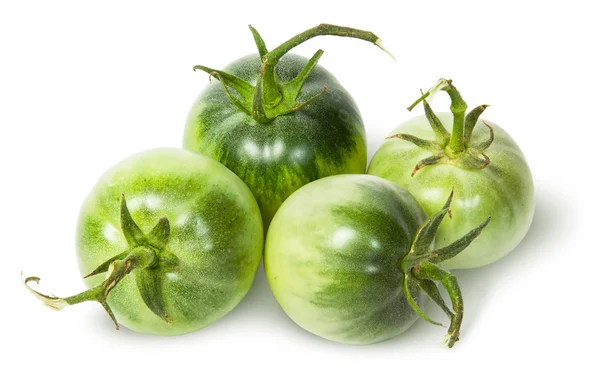 Vier groene tomaten in de buurt van — Stockfoto