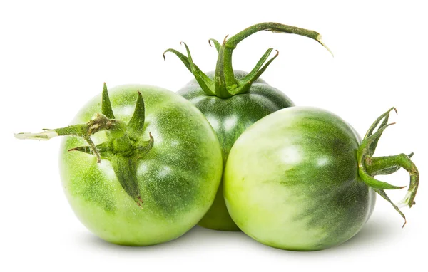 Tre gröna tomater nära — Stockfoto