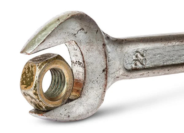 Closeup an old wrench and nut rotated — Stock Photo, Image