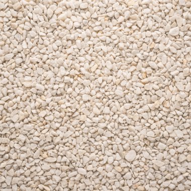 Küçük gri çakıl düz bir arka plan