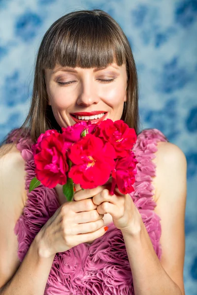 Beautiful woman with flowers — Stock Photo, Image