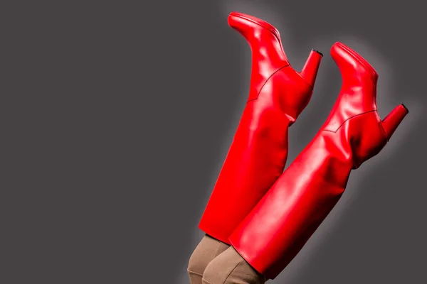 Autumn woman legs in high red boots — Stock Photo, Image