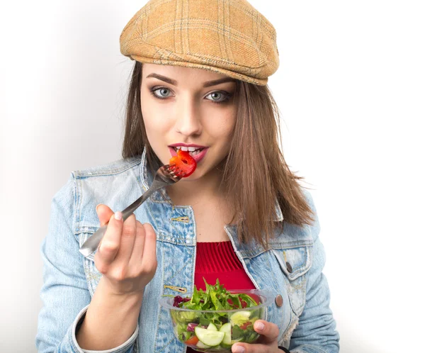 Woman eating healthy salad from plastic container — Stock Photo, Image