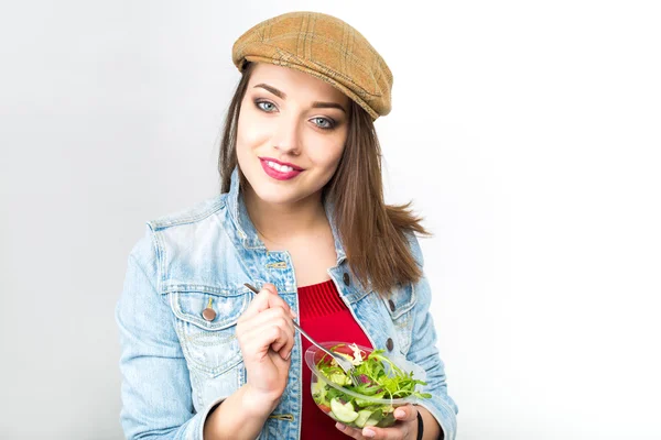 Woman eating healthy salad from plastic container — Stock Photo, Image