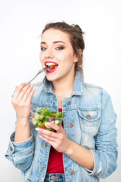 Woman eating healthy salad from plastic container — Stock Photo, Image