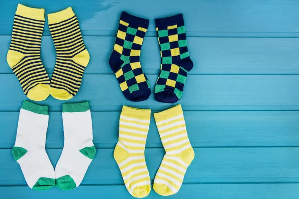 Various socks  on blue — Stock Photo, Image