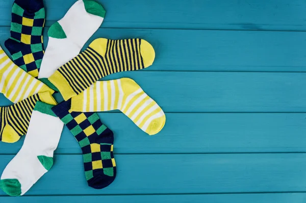 Various socks  on blue — Stock Photo, Image