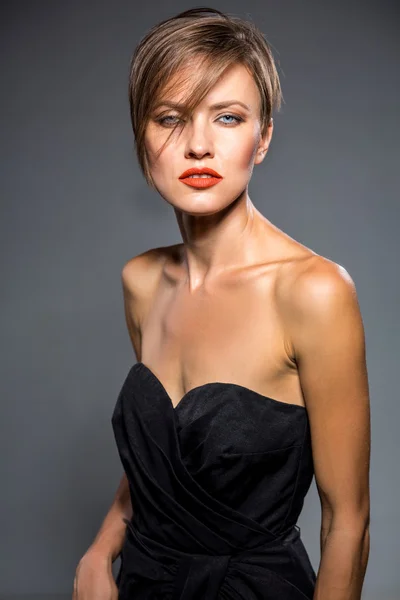 Portrait of beautiful girl with red lips short hair — Stock Photo, Image