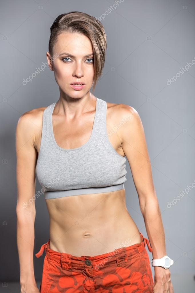 Athletic girl in sportswear Stock Photo by ©HappyCity 121343352 Athletic girl in sportswear Stock Photo by ©HappyCity 121343352