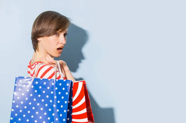 Beautiful Woman Holding Shopping Bags Blue Background — Stock Photo, Image