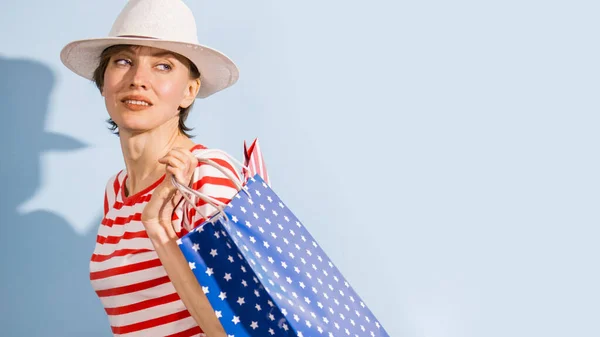 Happy Shopping Woman Shopping Bags Blue Background Wearing Striped Clothing — Stock Photo, Image