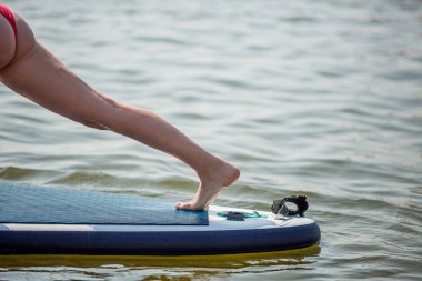 SUP yoga .Water sports , active lifestyle